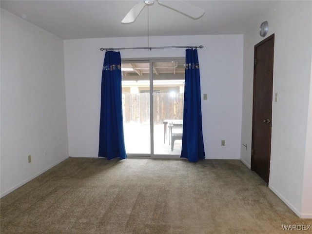 carpeted empty room with ceiling fan