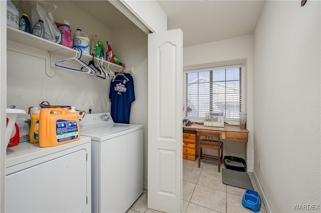 washroom with laundry area, independent washer and dryer, baseboards, and light tile patterned floors