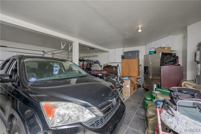 garage featuring stainless steel fridge