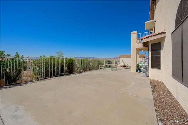 view of patio / terrace with fence