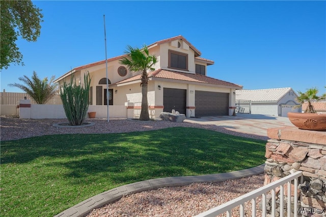 mediterranean / spanish house with driveway, a tiled roof, fence, and stucco siding