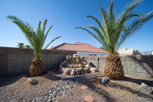 view of yard featuring a fenced backyard