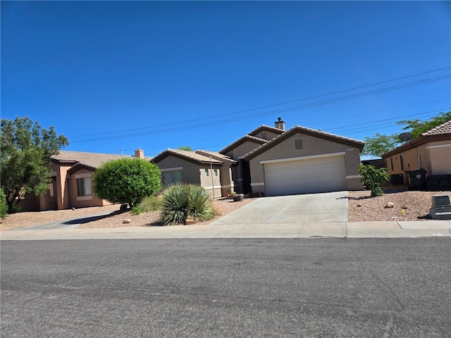 3836 Heather Ave, Kingman, AZ 86401 - ranch-style home featuring a garage, stucco siding, driveway, a tiled roof, and a chimney