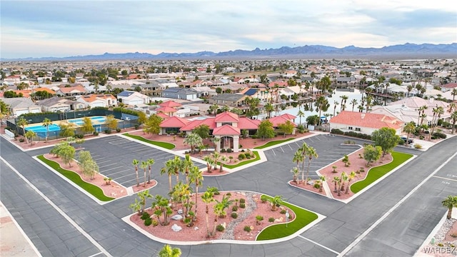 drone / aerial view with a residential view and a mountain view