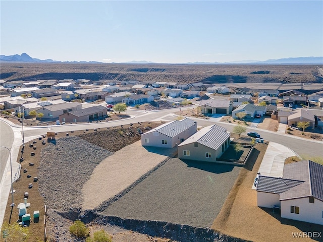 bird's eye view with a residential view and a mountain view