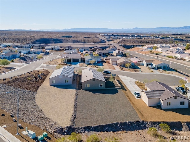 drone / aerial view with a mountain view and a residential view