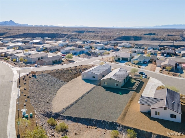 bird's eye view featuring a residential view and a mountain view