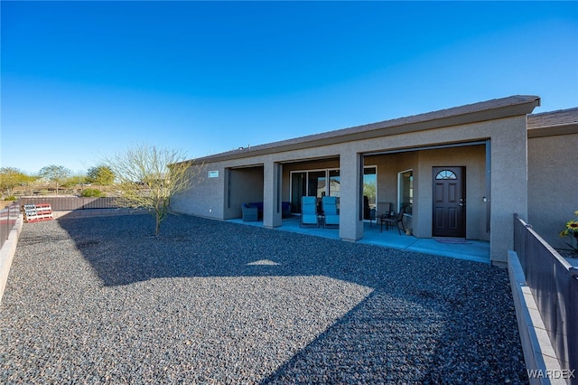 garage featuring fence