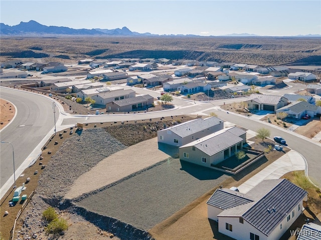 bird's eye view featuring a residential view and a mountain view