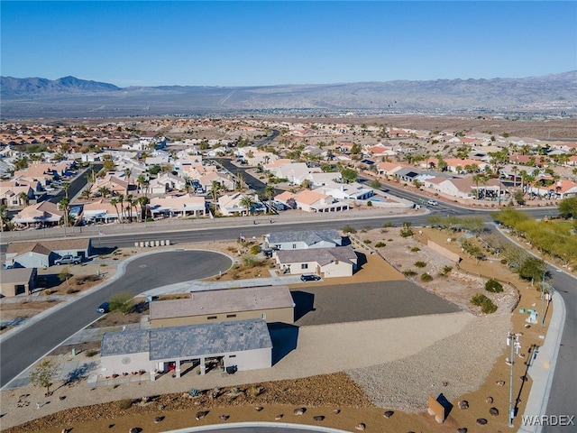 aerial view featuring a residential view and a mountain view