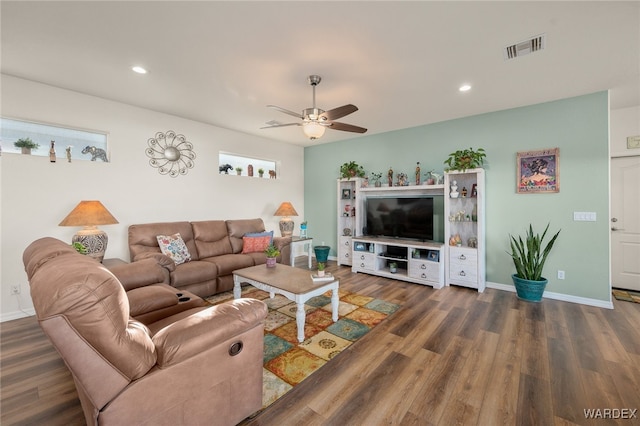 living room with dark wood-style flooring, recessed lighting, visible vents, a ceiling fan, and baseboards