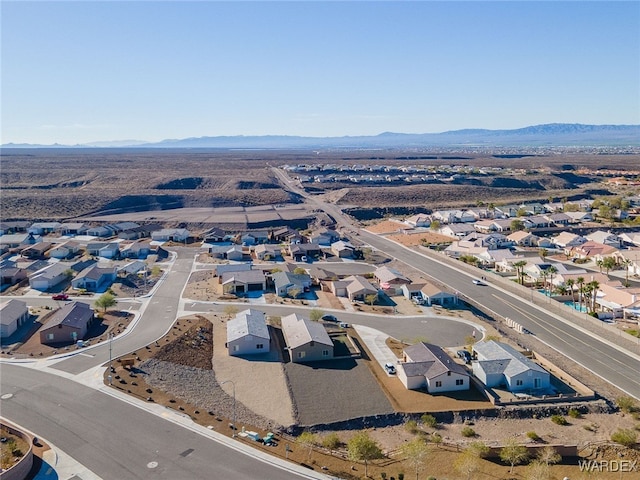 aerial view featuring a mountain view and a residential view