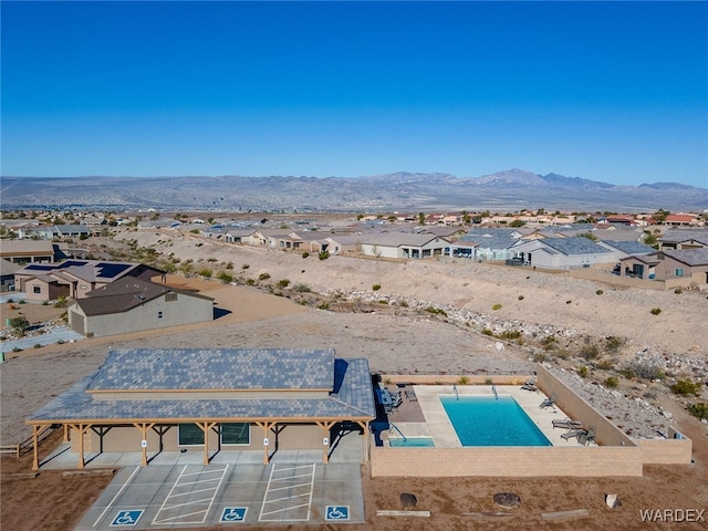 bird's eye view with a residential view and a mountain view