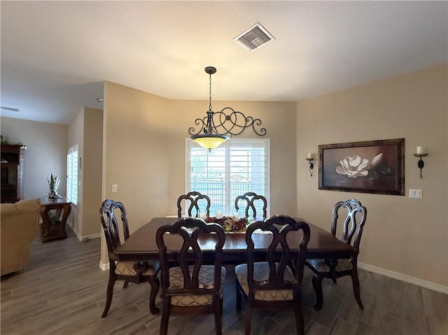 2600 Slide Mountain Loop, Bullhead City, AZ 86442 - dining room featuring wood finished floors