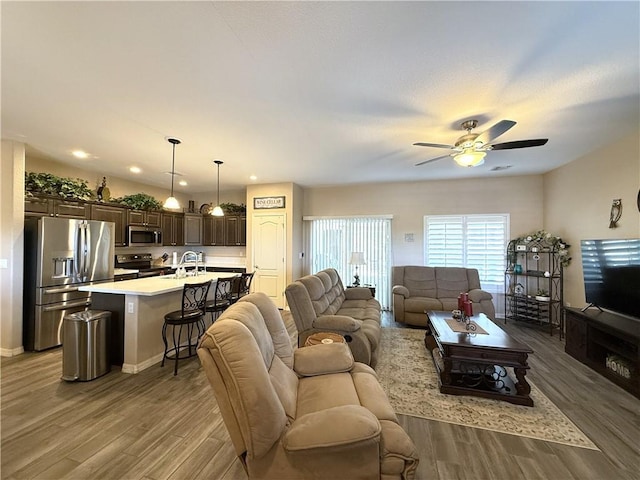 2600 Slide Mountain Loop, Bullhead City, AZ 86442 - living room featuring wood finished floors, ceiling fan, and recessed lighting