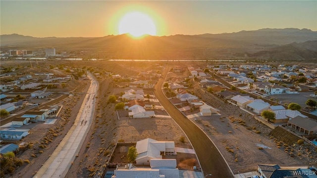 drone / aerial view with a residential view and a mountain view