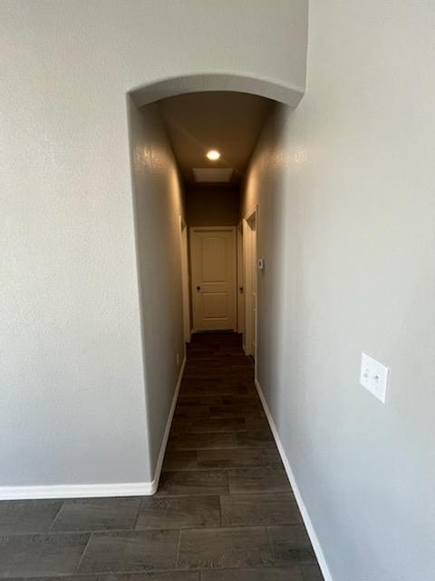 3515 E Lum Ave, Kingman, AZ 86409 - corridor featuring baseboards, arched walkways, and recessed lighting