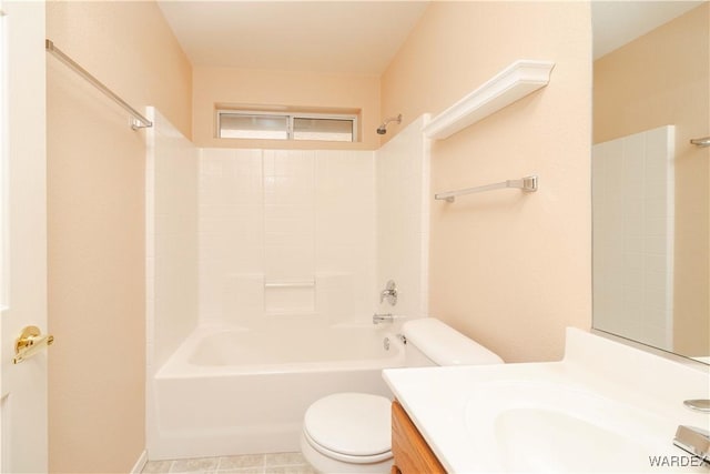 bathroom with tile patterned flooring, toilet, vanity, and bathing tub / shower combination