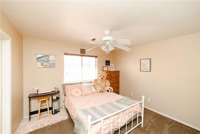 3048 Mallory Loop, Kingman, AZ 86401 - bedroom with carpet flooring, baseboards, and ceiling fan