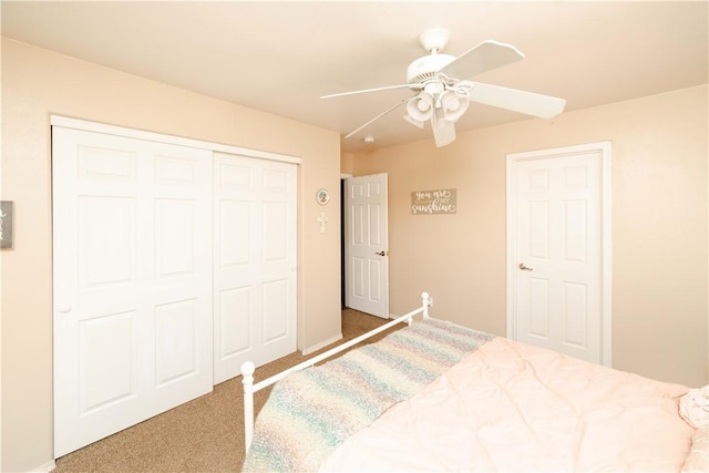 3048 Mallory Loop, Kingman, AZ 86401 - bedroom with a closet, carpet, and a ceiling fan