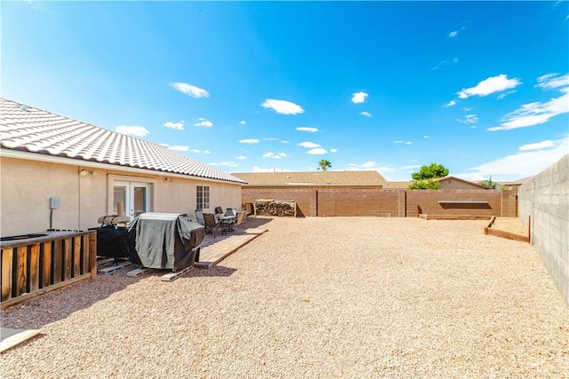 3048 Mallory Loop, Kingman, AZ 86401 - fenced backyard featuring french doors