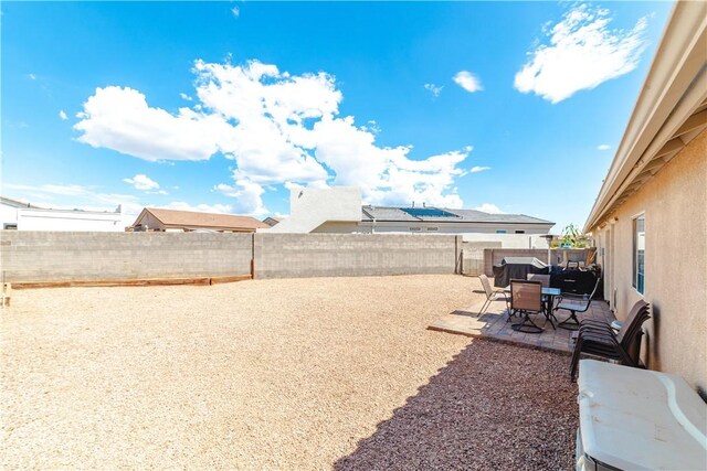 3048 Mallory Loop, Kingman, AZ 86401 - fenced backyard featuring a patio