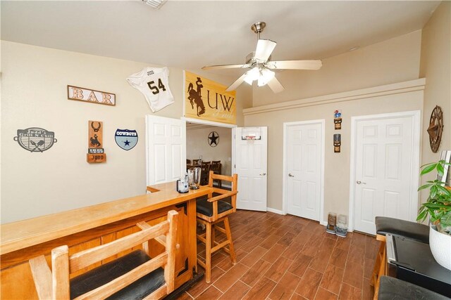 3048 Mallory Loop, Kingman, AZ 86401 - dining area featuring ceiling fan, dark wood-type flooring, and baseboards
