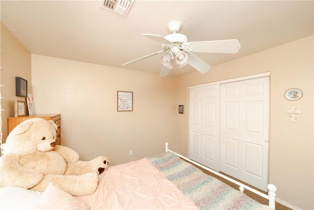 3048 Mallory Loop, Kingman, AZ 86401 - bedroom with a closet and ceiling fan