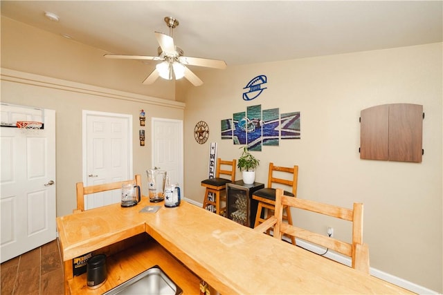 3048 Mallory Loop, Kingman, AZ 86401 - dining area with ceiling fan, vaulted ceiling, and baseboards