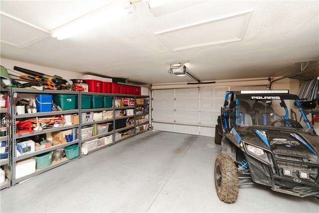 3048 Mallory Loop, Kingman, AZ 86401 - garage featuring a garage door opener