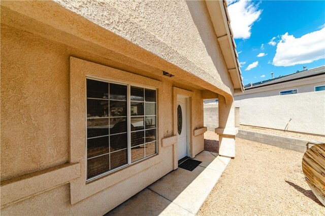 3048 Mallory Loop, Kingman, AZ 86401 - property entrance with stucco siding