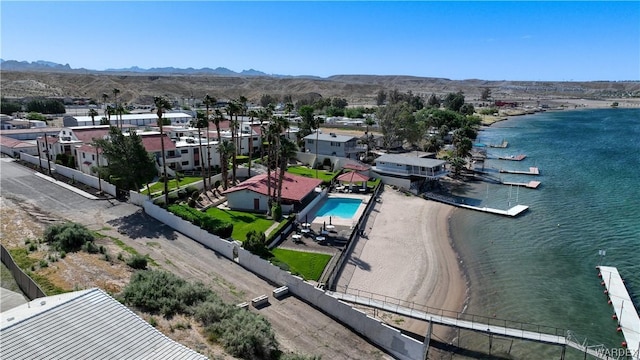 birds eye view of property featuring a residential view and a water and mountain view