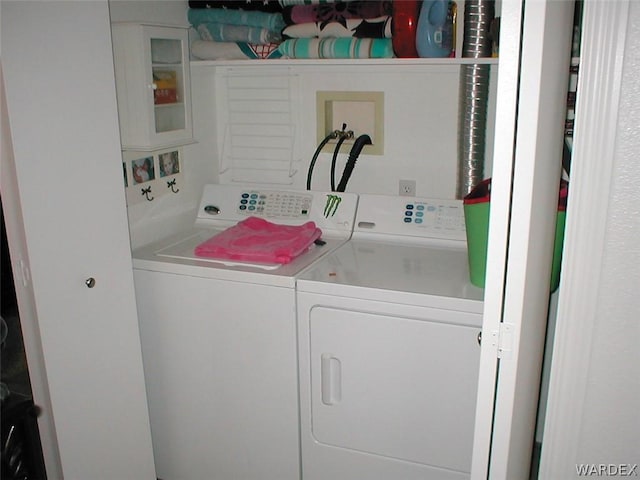 laundry area with laundry area and washing machine and dryer