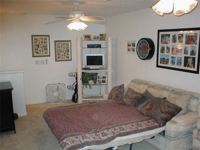 bedroom featuring ceiling fan and light colored carpet