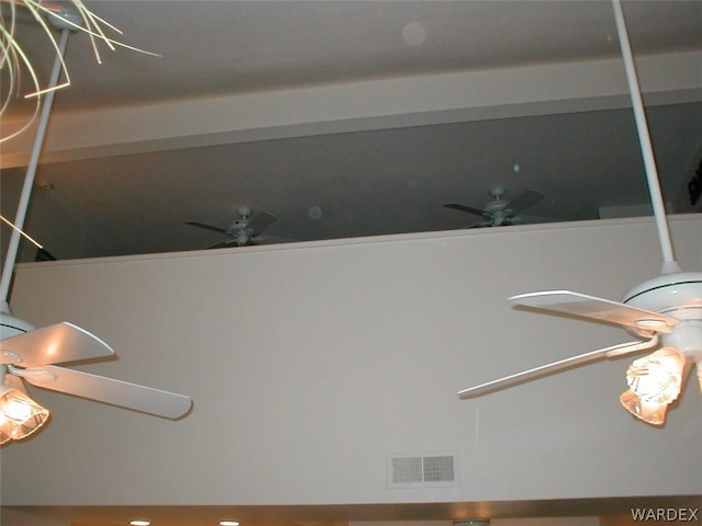 interior details with ceiling fan and visible vents