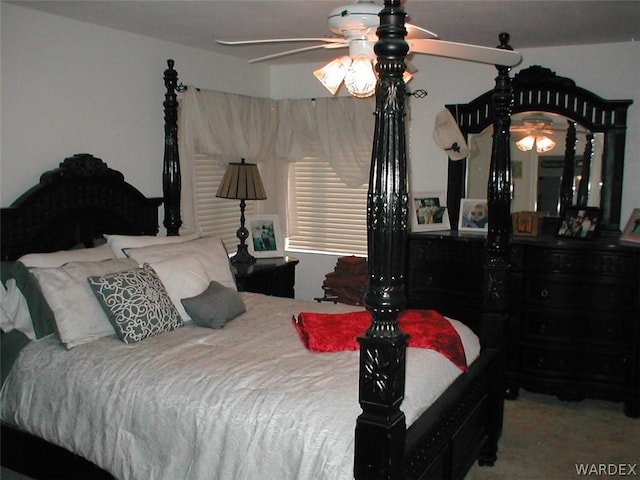 carpeted bedroom featuring a ceiling fan