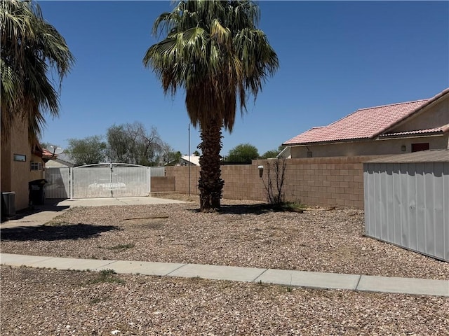 2024 E Mountain View Pl, Fort Mohave, AZ 86426 - view of yard featuring a gate