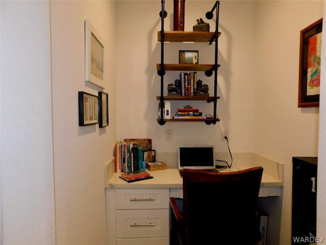 office area featuring built in desk