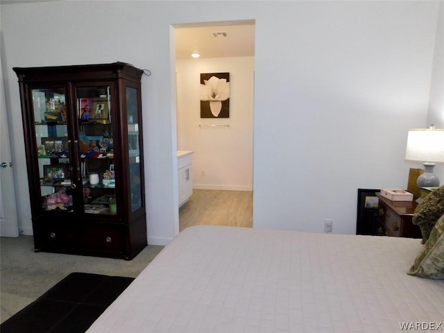 bedroom featuring baseboards