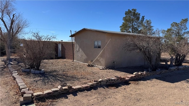 view of property exterior featuring stucco siding