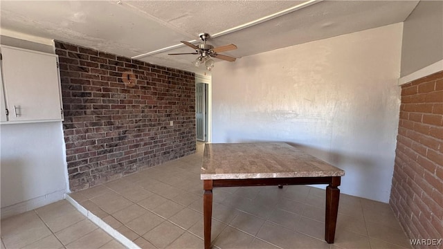 interior space featuring ceiling fan