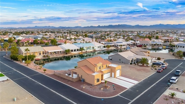 aerial view with a residential view and a water and mountain view