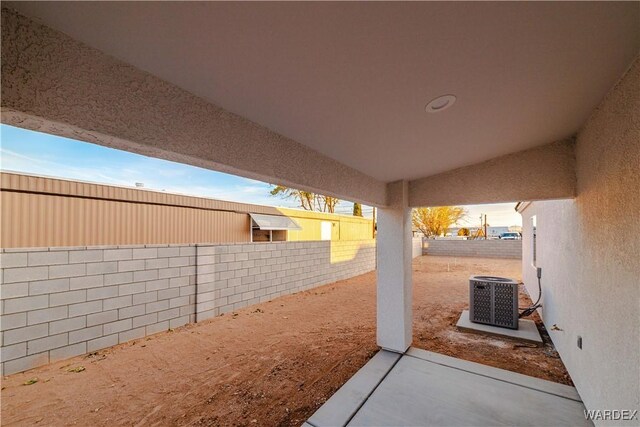 view of patio featuring a fenced backyard and central AC unit