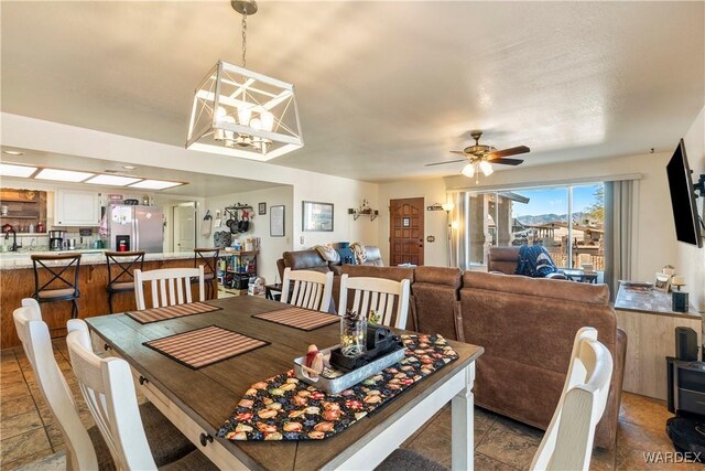 dining room featuring a ceiling fan