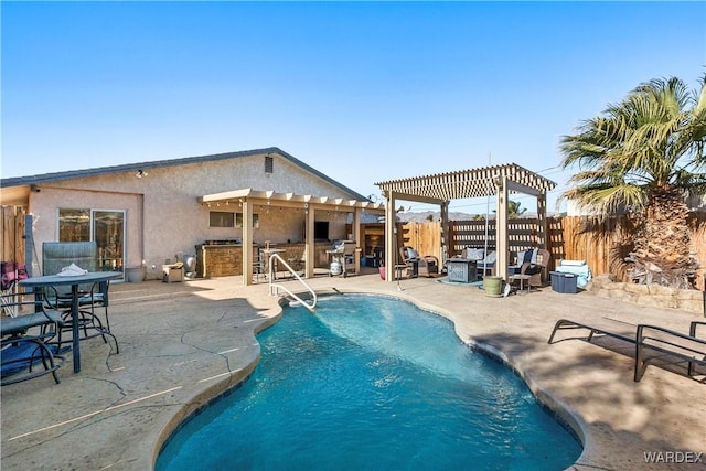 view of pool featuring a patio, fence, outdoor dry bar, and a pergola