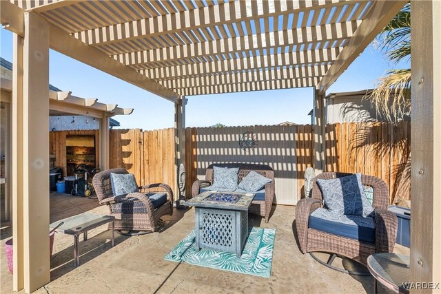 view of patio / terrace featuring an outdoor living space with a fire pit, fence, and a pergola