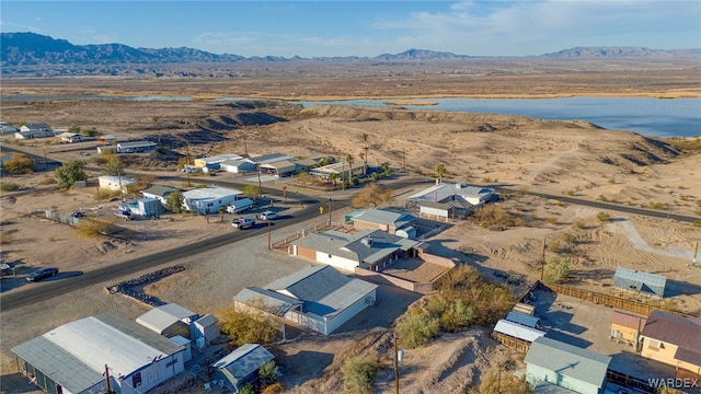 bird's eye view featuring a residential view and a water and mountain view