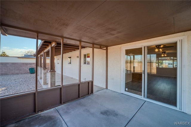 view of patio / terrace featuring fence