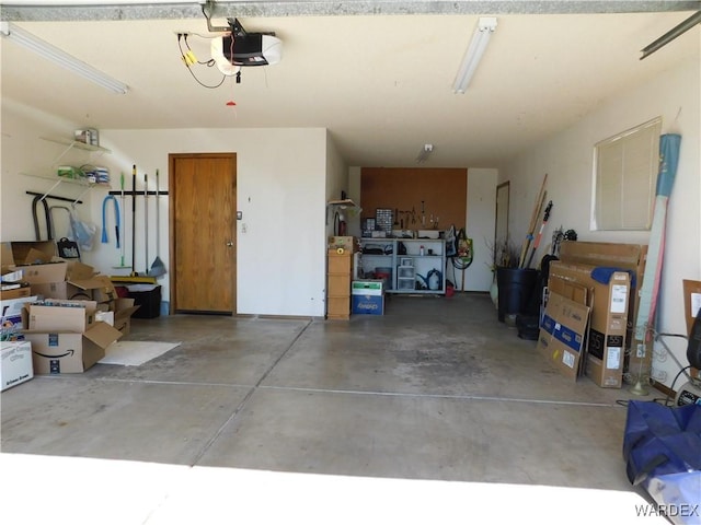 garage featuring a garage door opener