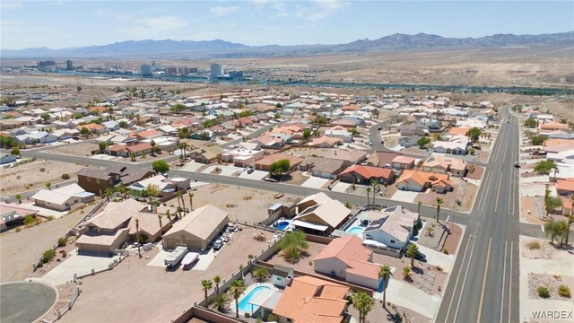 aerial view featuring a residential view and a mountain view